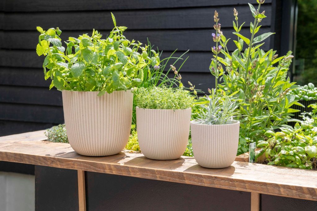 zaagsel bloempotten van capi